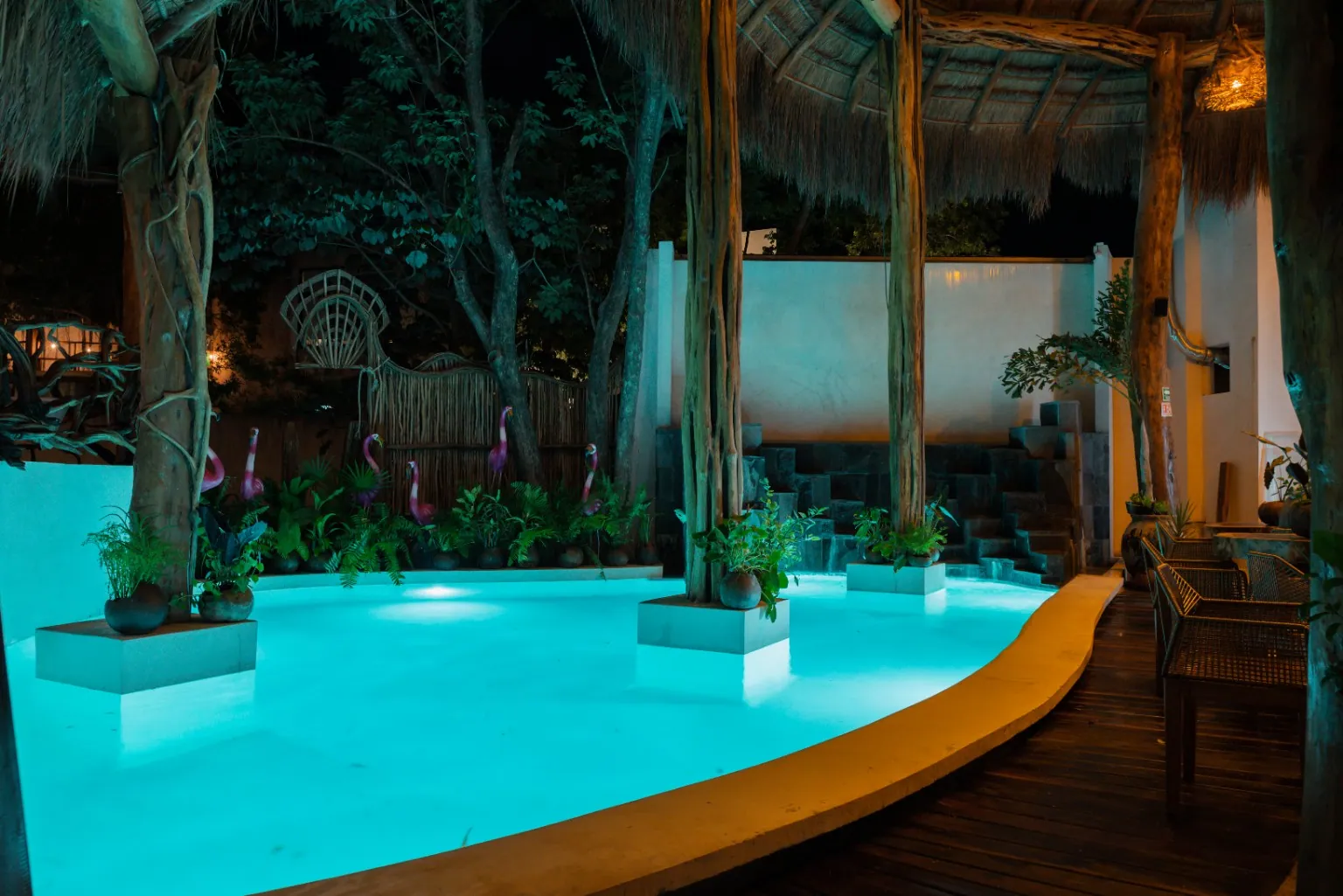 Illuminated pool at Xkeban boutique hotel, Tulum